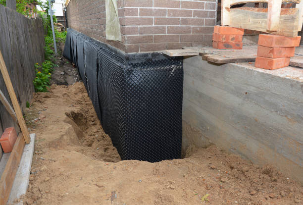 Happy homeowners after waterproofing job in Perth Amboy
